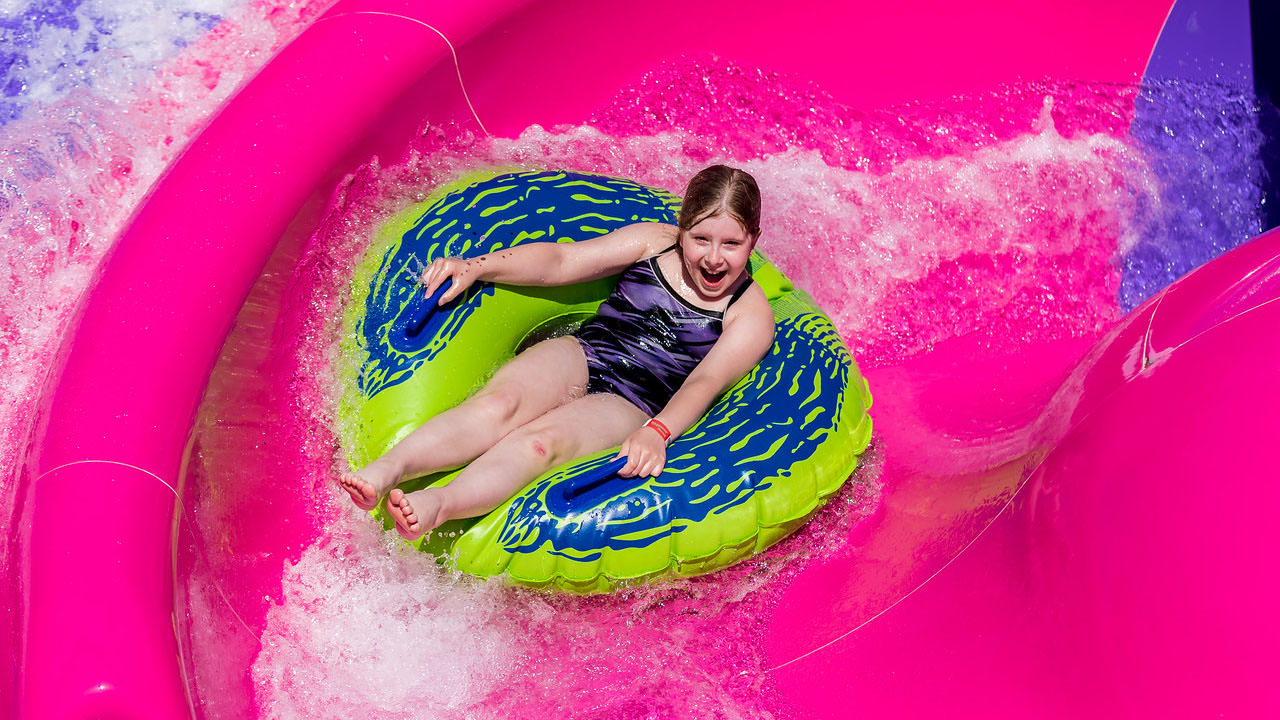 Guest riding the Cannon Bowl slide