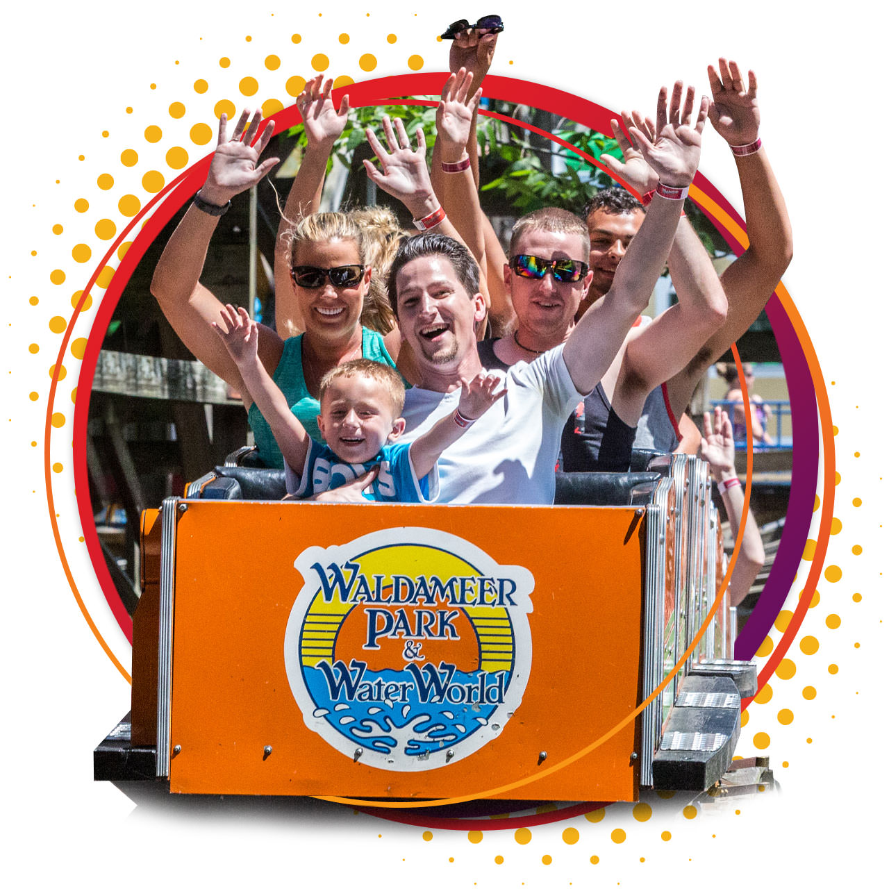 Guests riding an oragne roller coaster at Waldameer