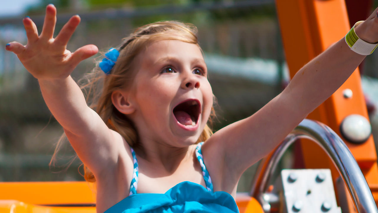 Guest riding Happy Swing