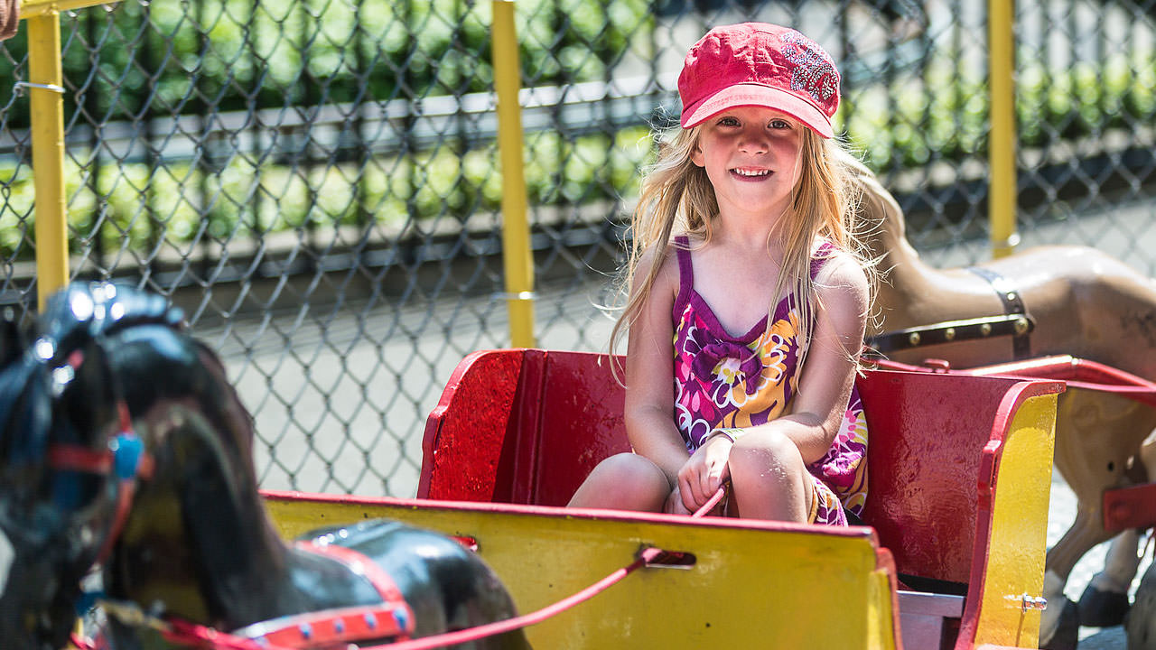 Guests riding Pony Cart