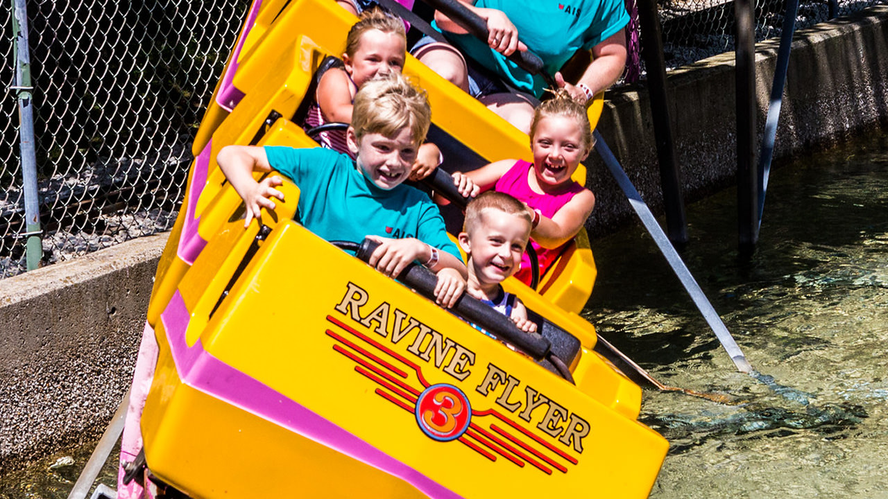 Guests riding the Ravine Flyer 3 during the day