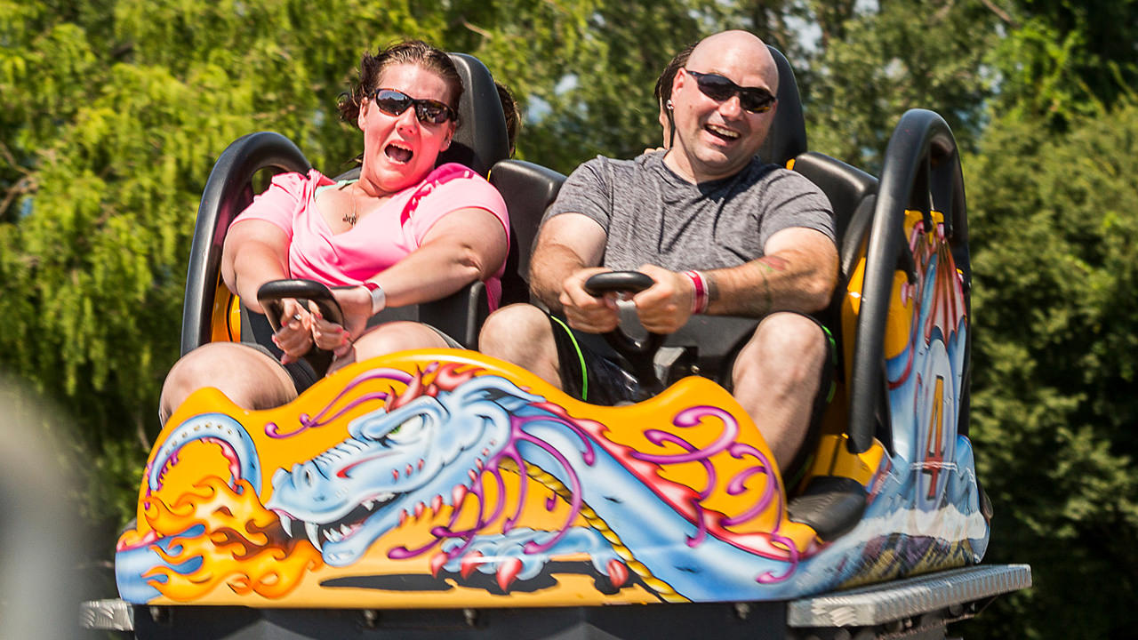 Guests riding the Steel Dragon during the day