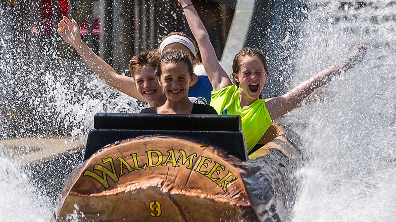 Guests riding Thunder River during the day