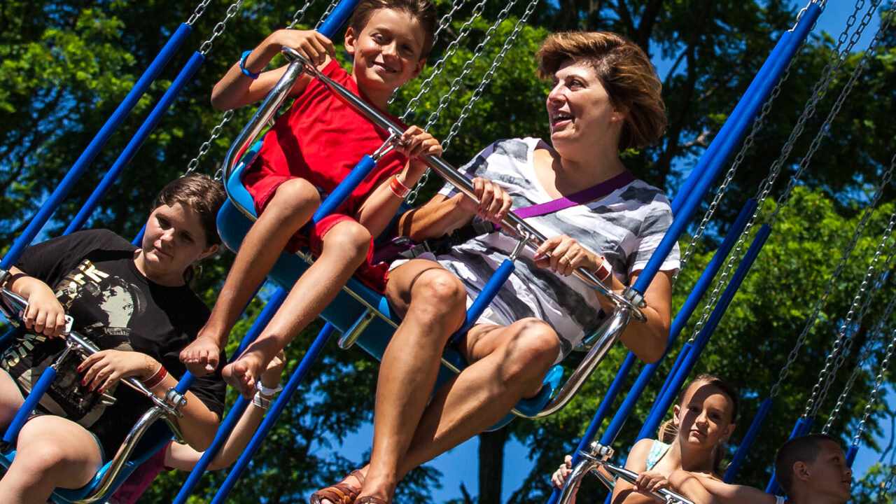 Guests enjoying Flying Swings at Waldameer.